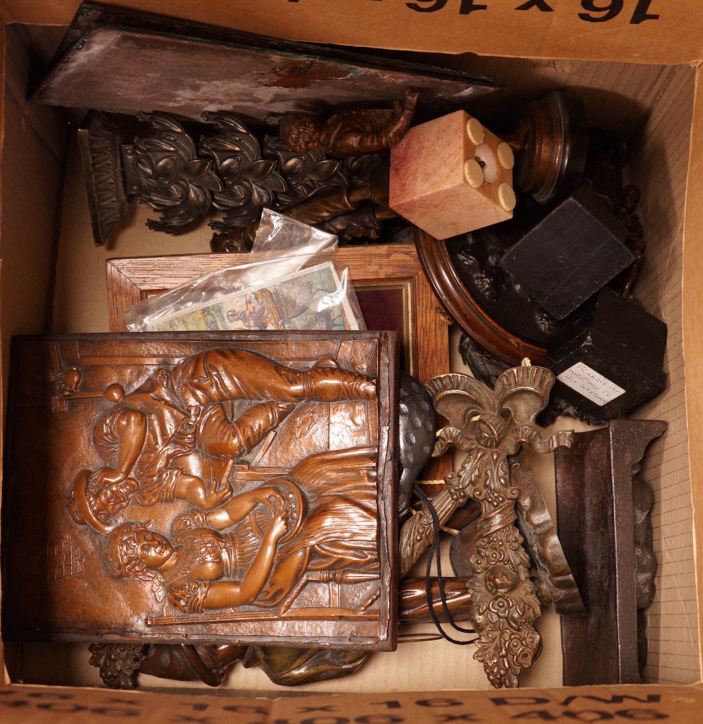 A mixed collection of decorative metalwares, including a gilt brass cherub plaque, a bronze figure of a boy cell signed L Grachner, a spelter figure of a Pierrot etc.